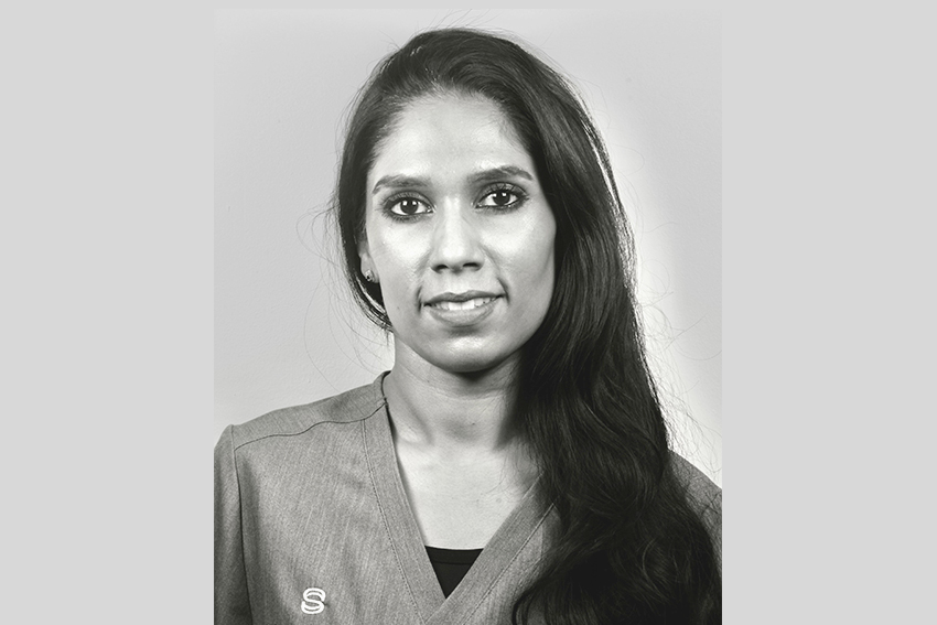 Black and white headshot portrait of Dr Angela Periodontist at Surbiton Dental