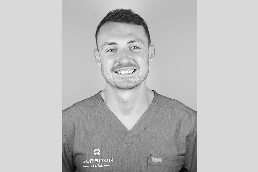 Black and white headshot portrait of Dr Jack Connan at Surbiton Dental