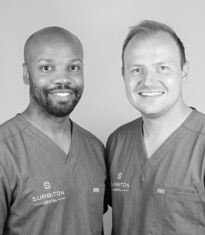 Black and white portrait of Dr Keiron and Dr Wiktor at Surbiton Dental